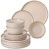 Plays 18-piece stoneware dinnerware set with steak and vegetables on marble table - featuring sandy speckled plates and bowls with brown rims-vancasso
