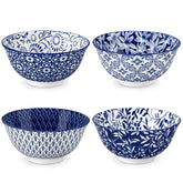 Selene porcelain cereal bowls set of 4 blue and white Japanese inspired floral pattern mix and match tableware styled with fruits and dishes on dining table