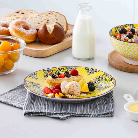 Boho chic jasmin 12-piece porcelain dinnerware set – vibrant japanese-inspired plates and bowls with dessert, bagels, and milk on white table