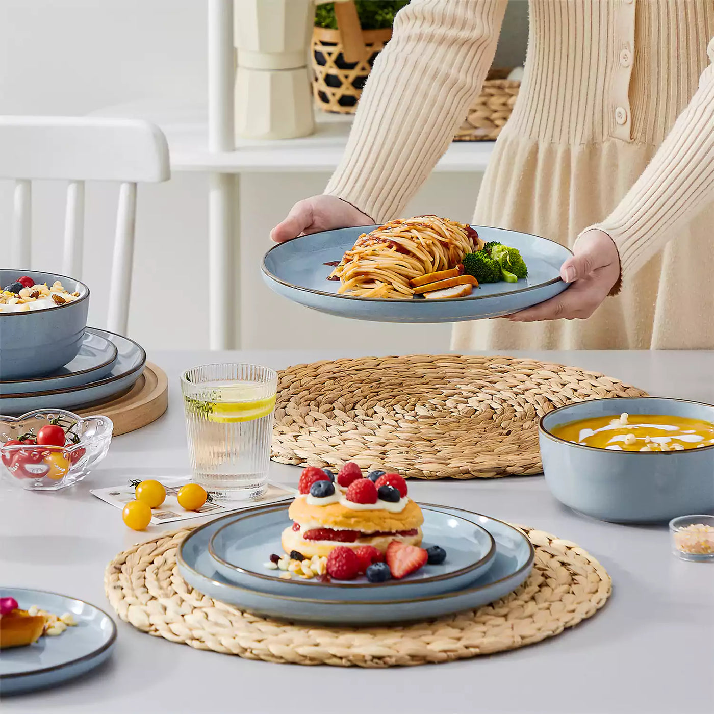 Rustic Loire 18-piece set with warm brown edges, displaying vibrant farm-to-table dishes
