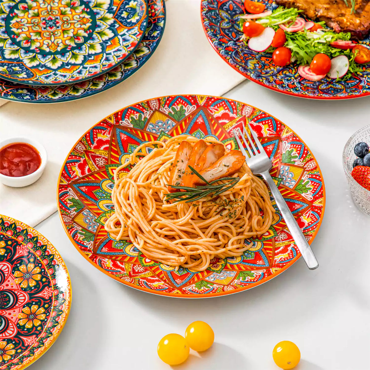 Lumi Bohemian porcelain dinner plate detail closeup with orange pasta serving on white table runner mandala pattern set of 6.
