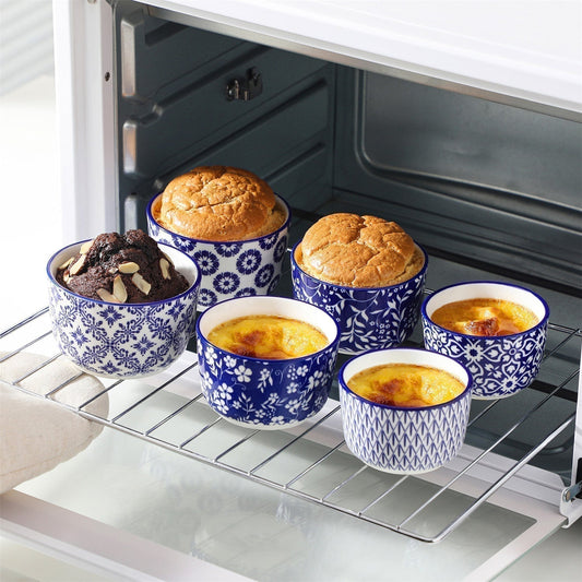 Golden baked dessert in oven with 8oz Selene Ramekin Bowls Set of 6, indigo floral porcelain perfect for crème brûlée, soufflés, and molten cakes