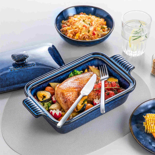 Starry 3.8qt casserole with lid, reactive glaze, filled with roasted chicken, paired with Starry collection dinnerware