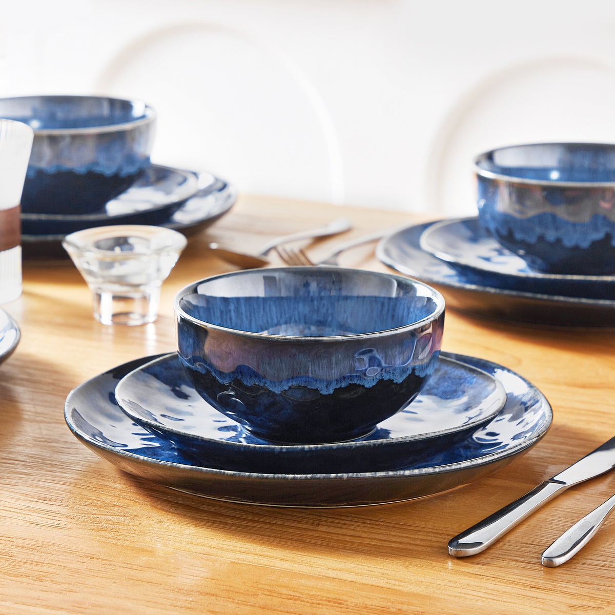 vancasso Starry 12 Piece Petite Stoneware Dinnerware Set in Blue  with a unique reactive glaze, perfect for a monochromatic blue table setting or pairing with neutral tones.