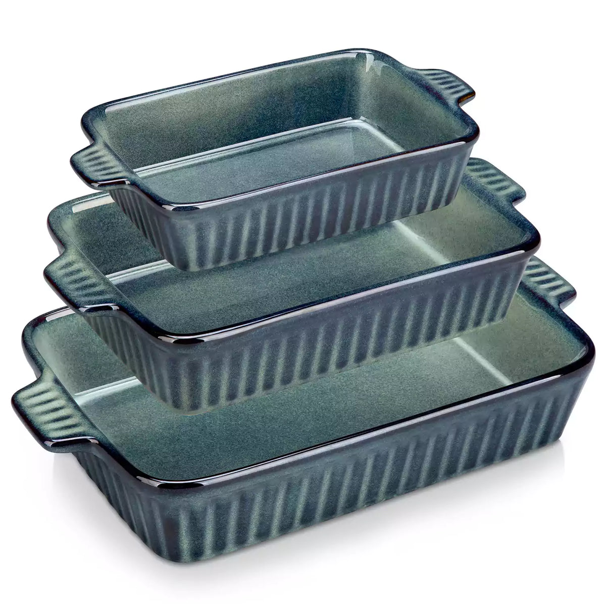 Starry 3 piece stoneware bakeware set with reactive glaze in green on a wooden table