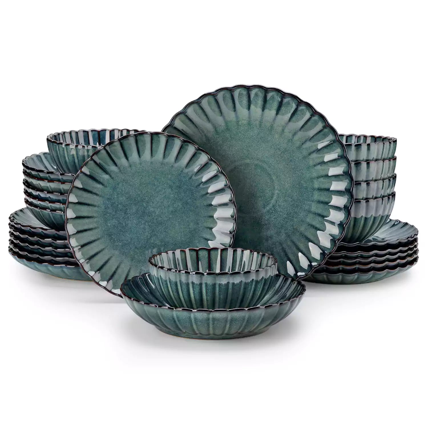 Farmhouse dining table set with Adonis teal green reactive glaze stoneware plates woven placemats and wooden chairs