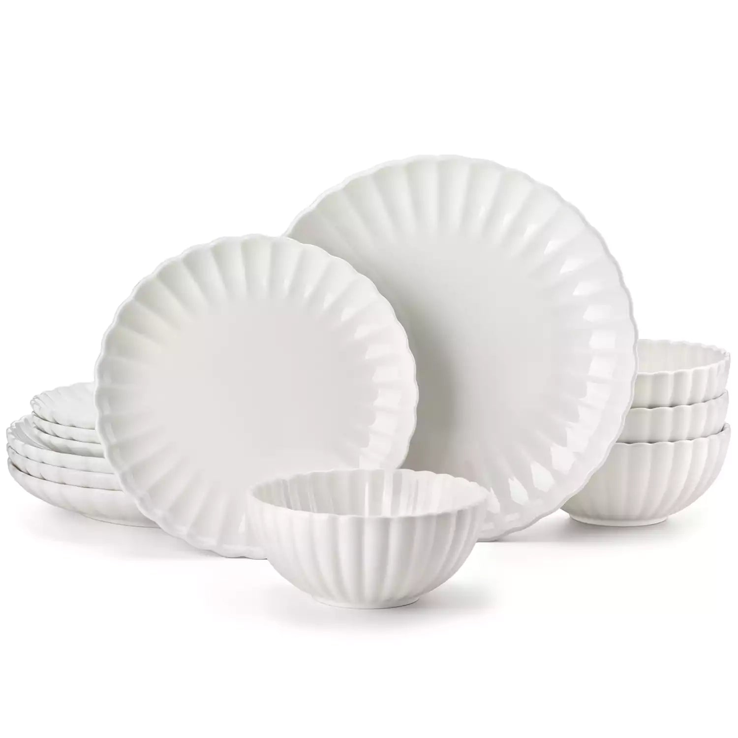 Bright modern dining room with Adonis white porcelain plates bowls white chairs and light wood accents
