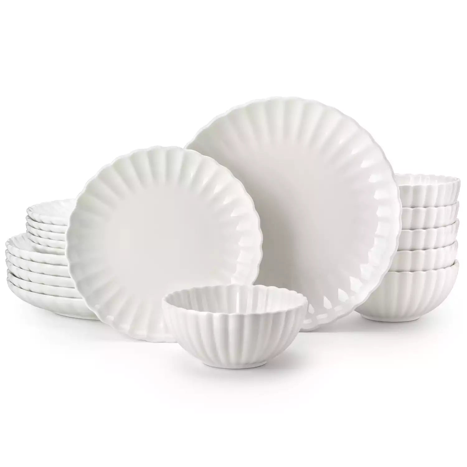 Adonis 18 piece white porcelain dinnerware set styled with food and glassware on a modern dining table