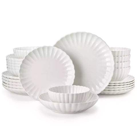 Adonis 24 piece white porcelain dinnerware set for 6 styled with pasta soup and fruit on a modern dining table