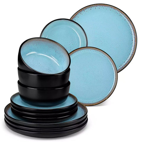 Rustic dining table with Amber 12-piece stoneware dinnerware in farmhouse blue - featuring reactive glaze plates - bowls - and utensils by vancasso