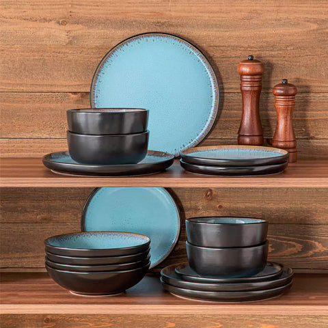 Assorted dishes with soup - dessert -  and fruit salad on rustic wooden table - Amber 16-Piece blue stoneware dinnerware set with plates and bowls by vancasso