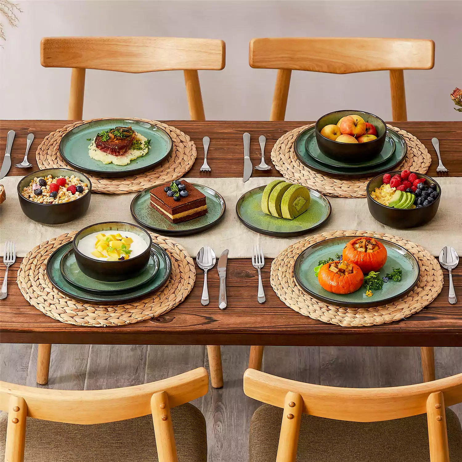 Rustic dining table with Amber 12-piece stoneware dinnerware in farmhouse green - featuring reactive glaze plates - bowls - and utensils by vancasso