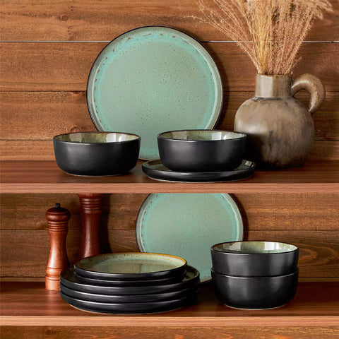 Rustic dining table with Amber 12-piece stoneware dinnerware in farmhouse green - featuring reactive glaze plates - bowls - and utensils by vancasso