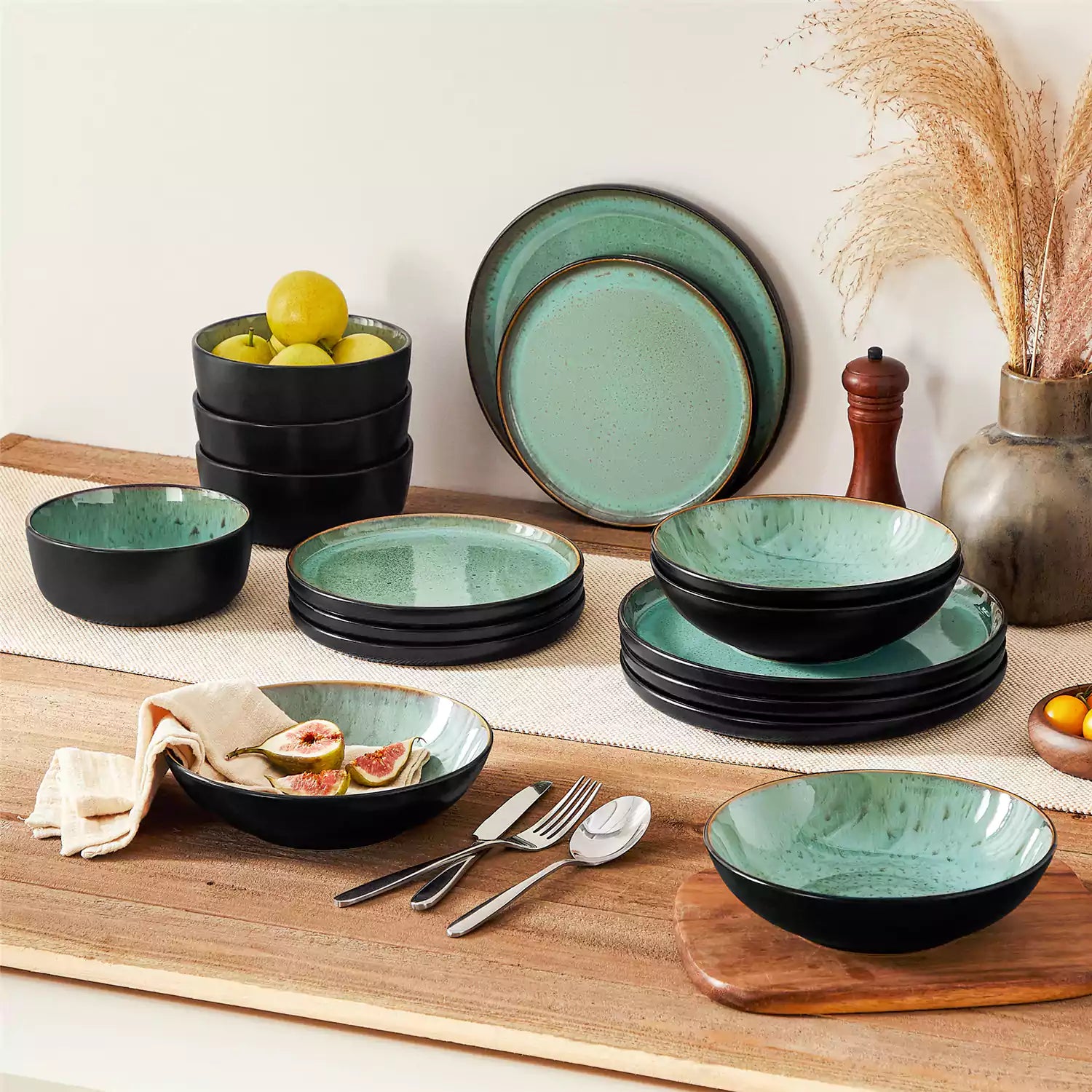 Assorted dishes with soup - dessert -  and fruit salad on rustic wooden table - Amber 16-Piece green stoneware dinnerware set with plates and bowls by vancasso