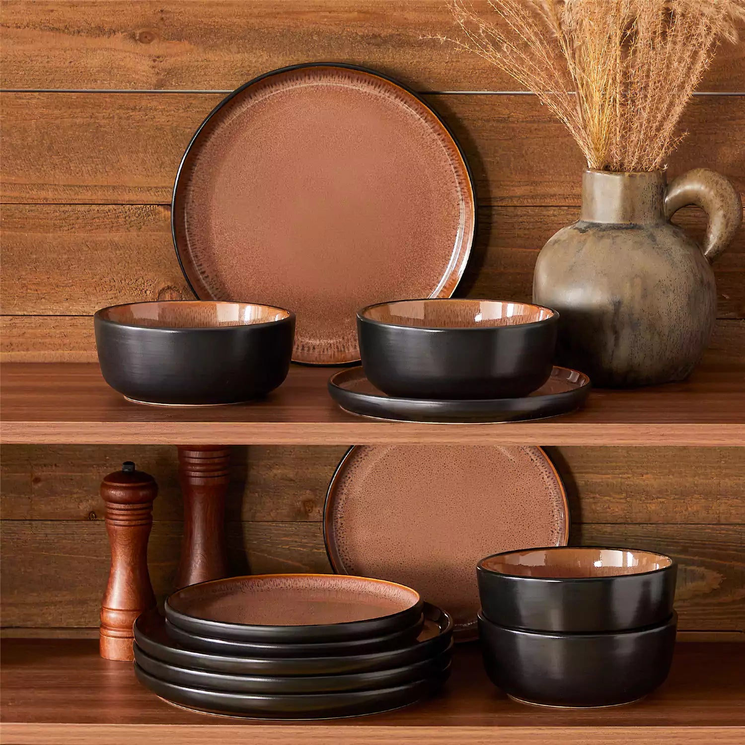 Rustic dining table with Amber 12-piece stoneware dinnerware in farmhouse red - featuring reactive glaze plates - bowls - and utensils by vancasso