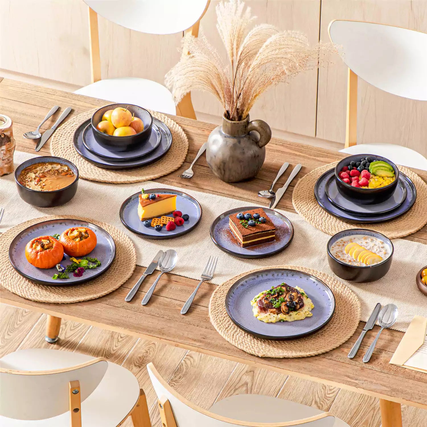 Rustic dining table with Amber 12-piece stoneware dinnerware in farmhouse violet - featuring reactive glaze plates - bowls - and utensils by vancasso