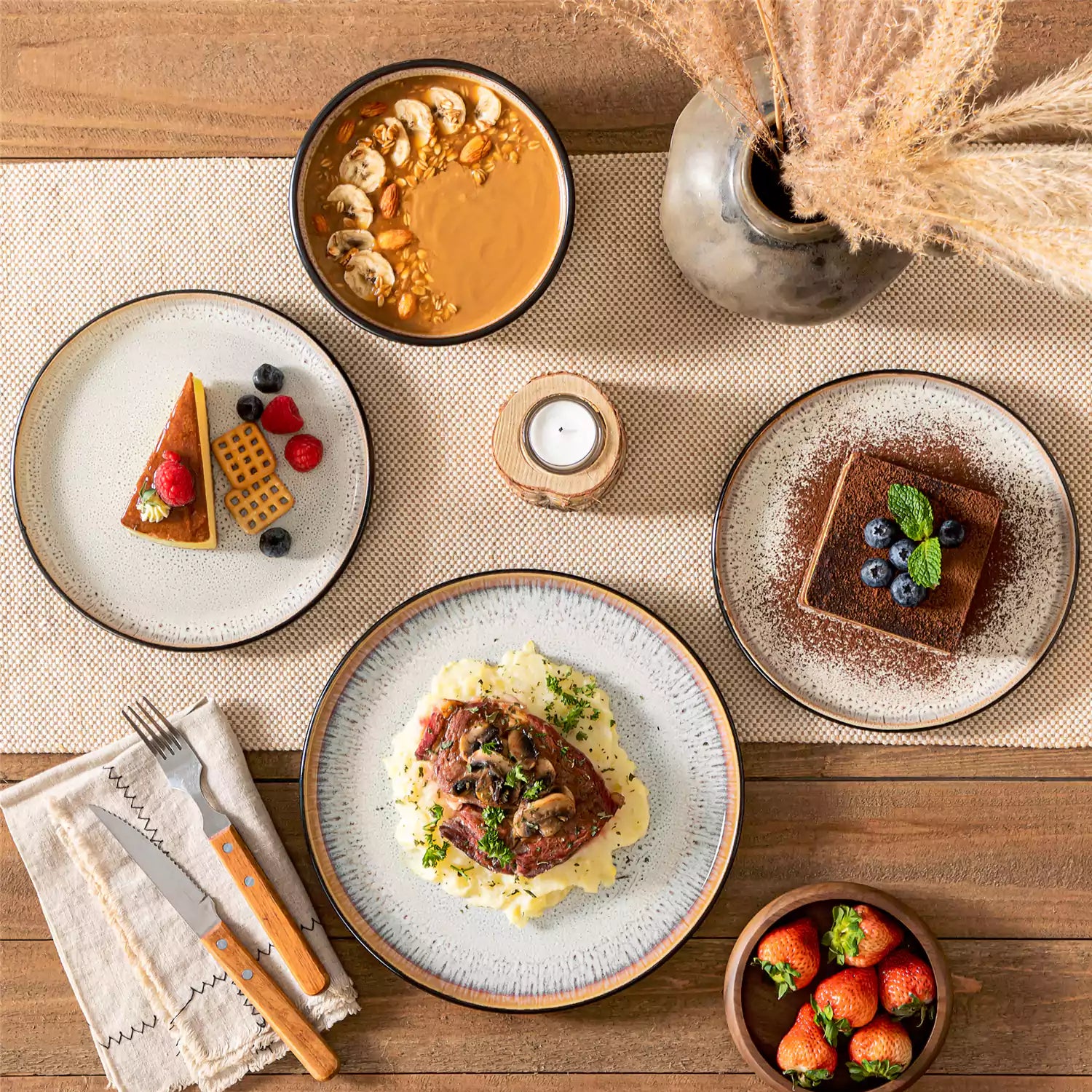 Rustic dining table with Amber 12-piece stoneware dinnerware in farmhouse beige - featuring reactive glaze plates - bowls - and utensils by vancasso