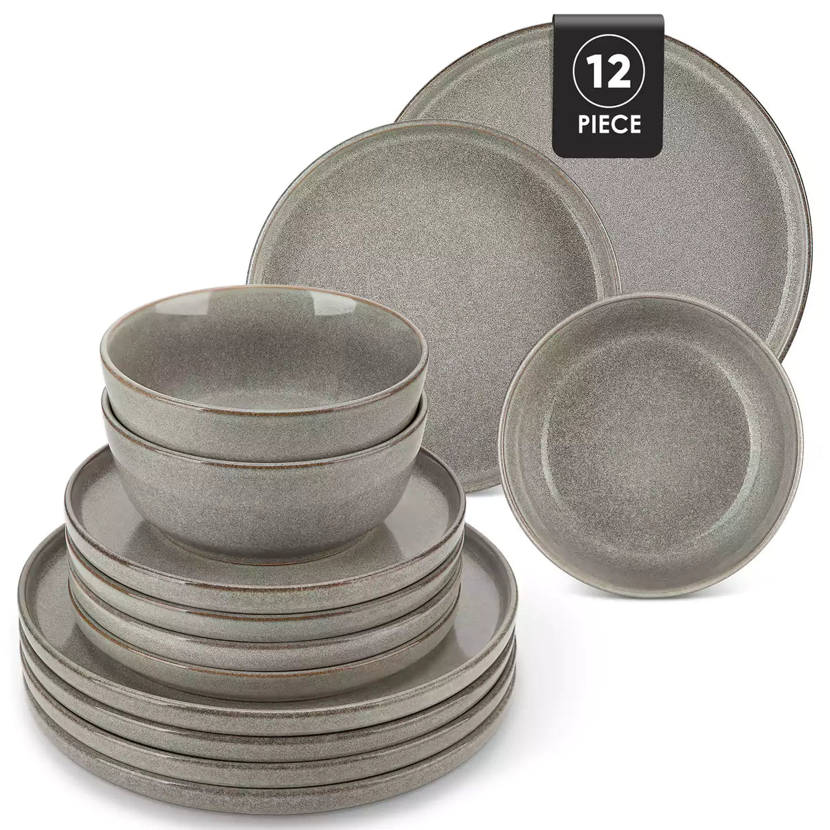 Brown stoneware plates and bowls with reactive glaze on farmhouse wooden table with woven placemats