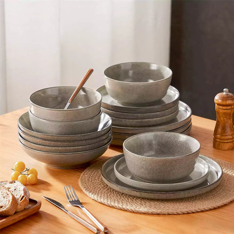 Handcrafted brown stoneware with reactive glaze on woven placemats - perfect for farmhouse tables