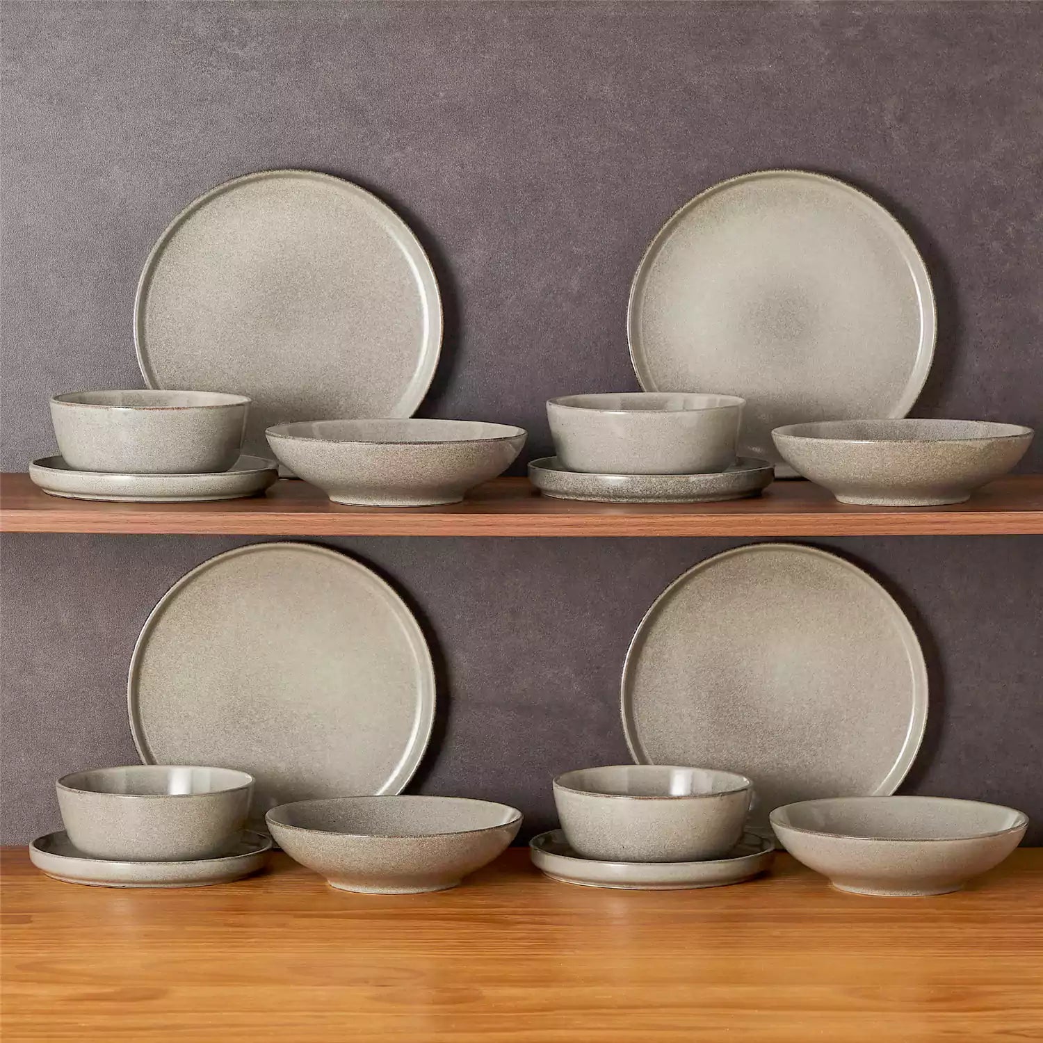 Handcrafted brown stoneware with reactive glaze on woven placemats - perfect for farmhouse tables