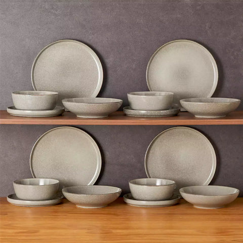 Handcrafted brown stoneware with reactive glaze on woven placemats - perfect for farmhouse tables