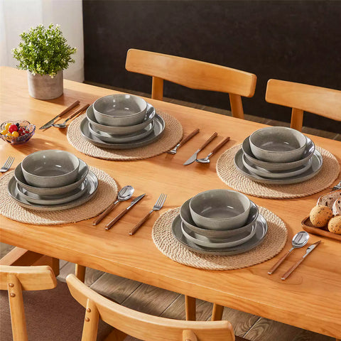 Handcrafted brown stoneware with reactive glaze on woven placemats - perfect for farmhouse tables
