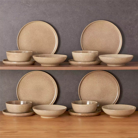 Handcrafted caramel stoneware with reactive glaze on woven placemats - perfect for farmhouse tables