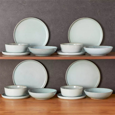Handcrafted mint green stoneware with reactive glaze on woven placemats - perfect for farmhouse tables