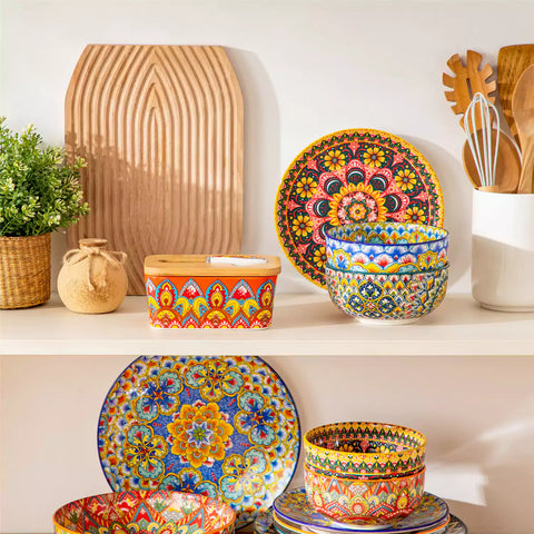 Lumi bold orange porcelain butter dish with lid in vibrant Bohemian pattern on a wooden table