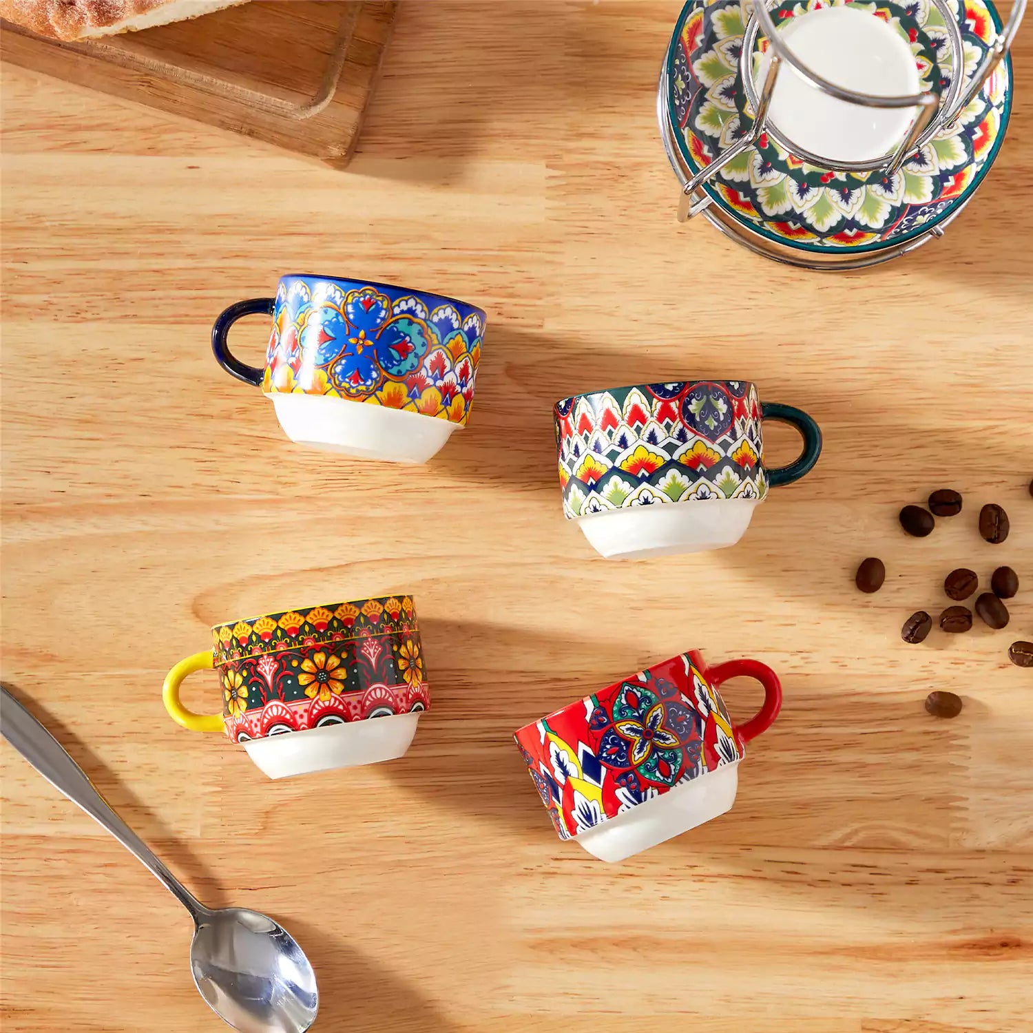 Lumi 6 piece 3oz porcelain coffee cup and saucer set with vibrant  pattern Bohemian design on a rustic wooden table