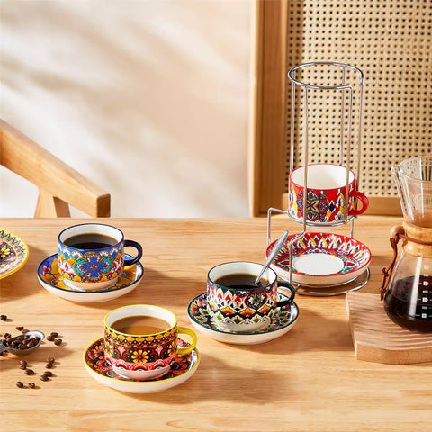 Lumi 6 piece 9oz porcelain coffee cup and saucer set with vibrant  pattern Bohemian design on a rustic wooden table