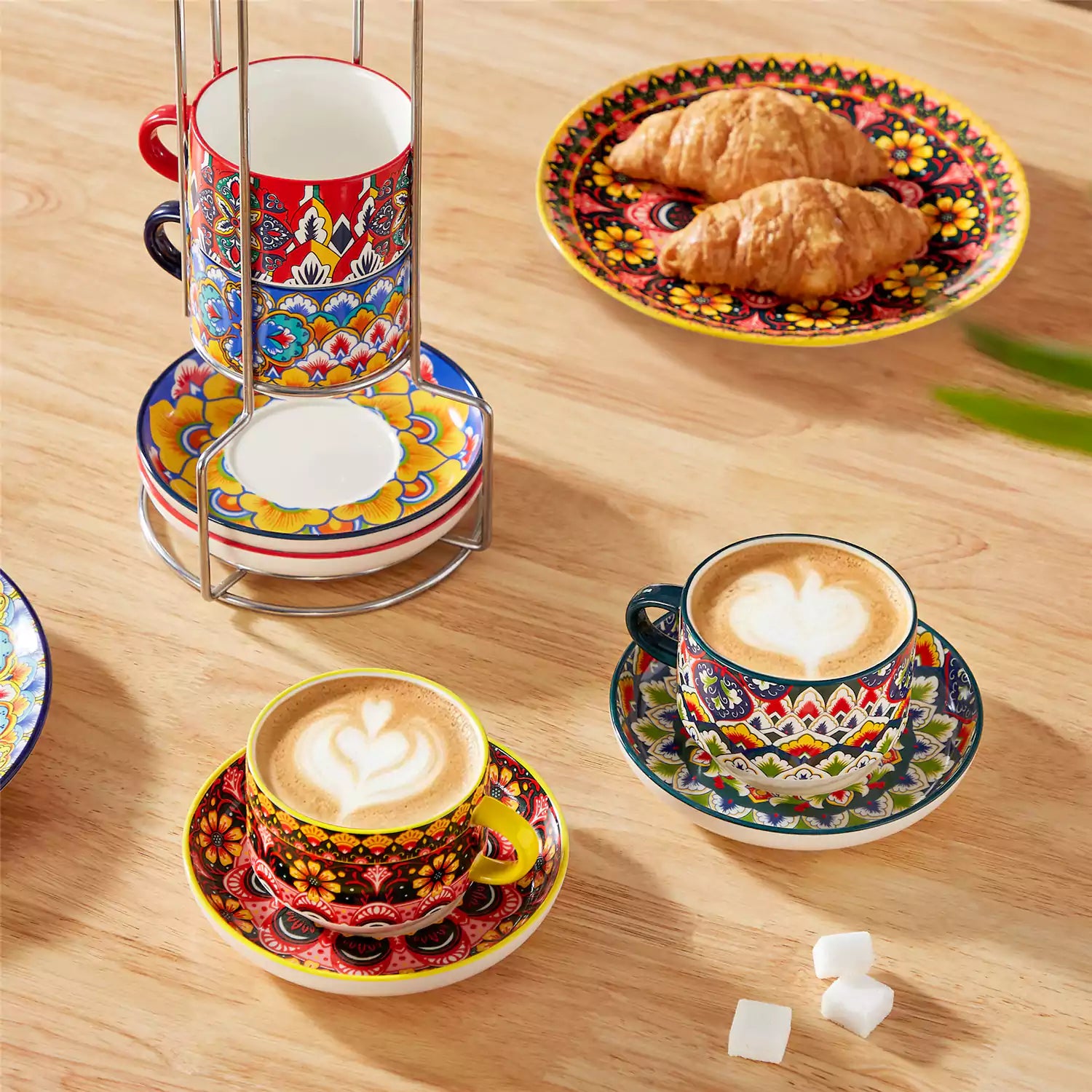 Lumi 6 piece 9oz porcelain coffee cup and saucer set with vibrant  pattern Bohemian design on a rustic wooden table