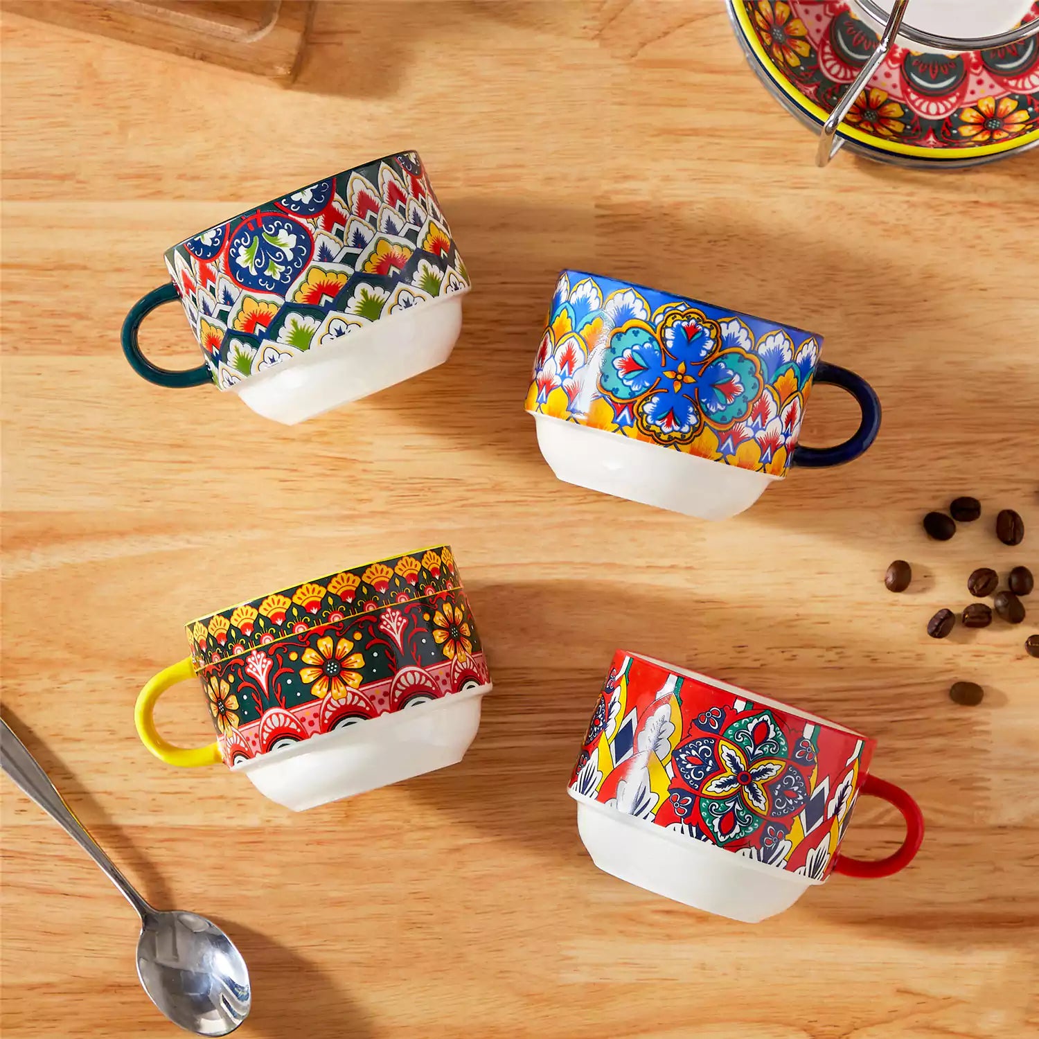 Lumi 6 piece 9oz porcelain coffee cup and saucer set with vibrant  pattern Bohemian design on a rustic wooden table