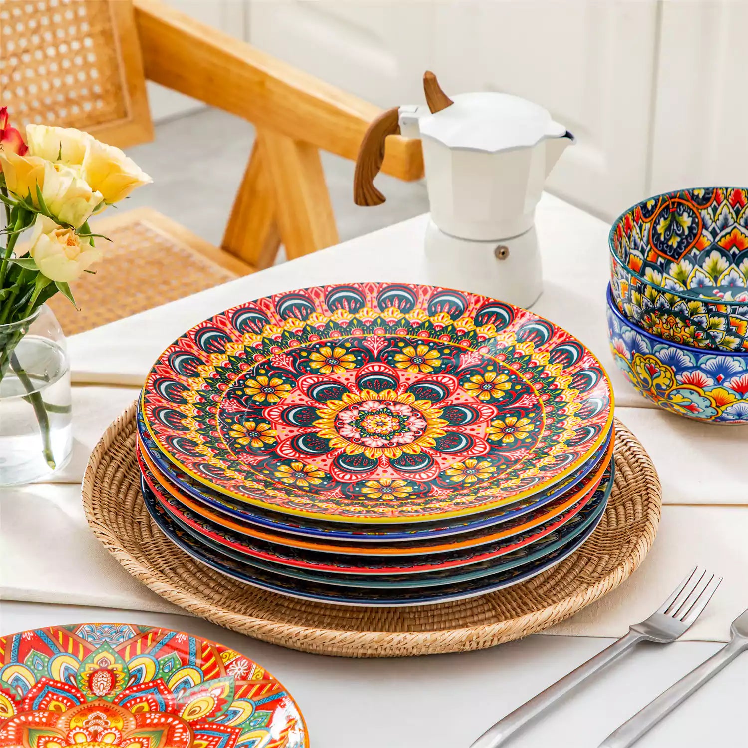 Lumi 6-piece 10.5'' Bohemian dinner plates with colorful mandala patterns on a white table with fruit and cutlery