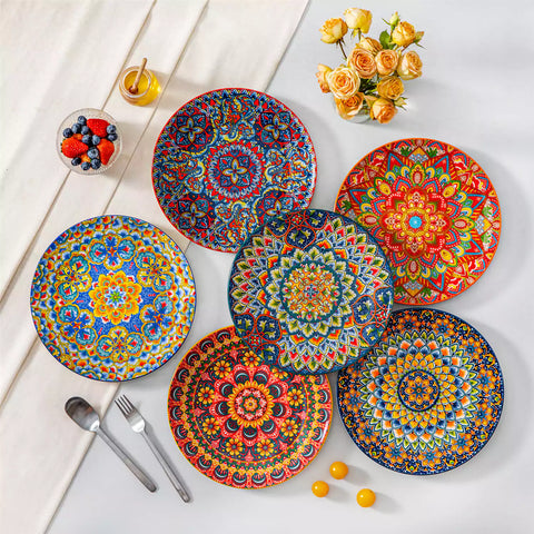 Lumi 6-piece 10.5'' Bohemian dinner plates with colorful mandala patterns on a white table with fruit and cutlery
