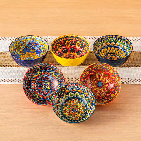 Colorful 26oz Lumi porcelain bowls on rattan placemats filled with oatmeal berries roasted broccoli and cherries on a linen table runner