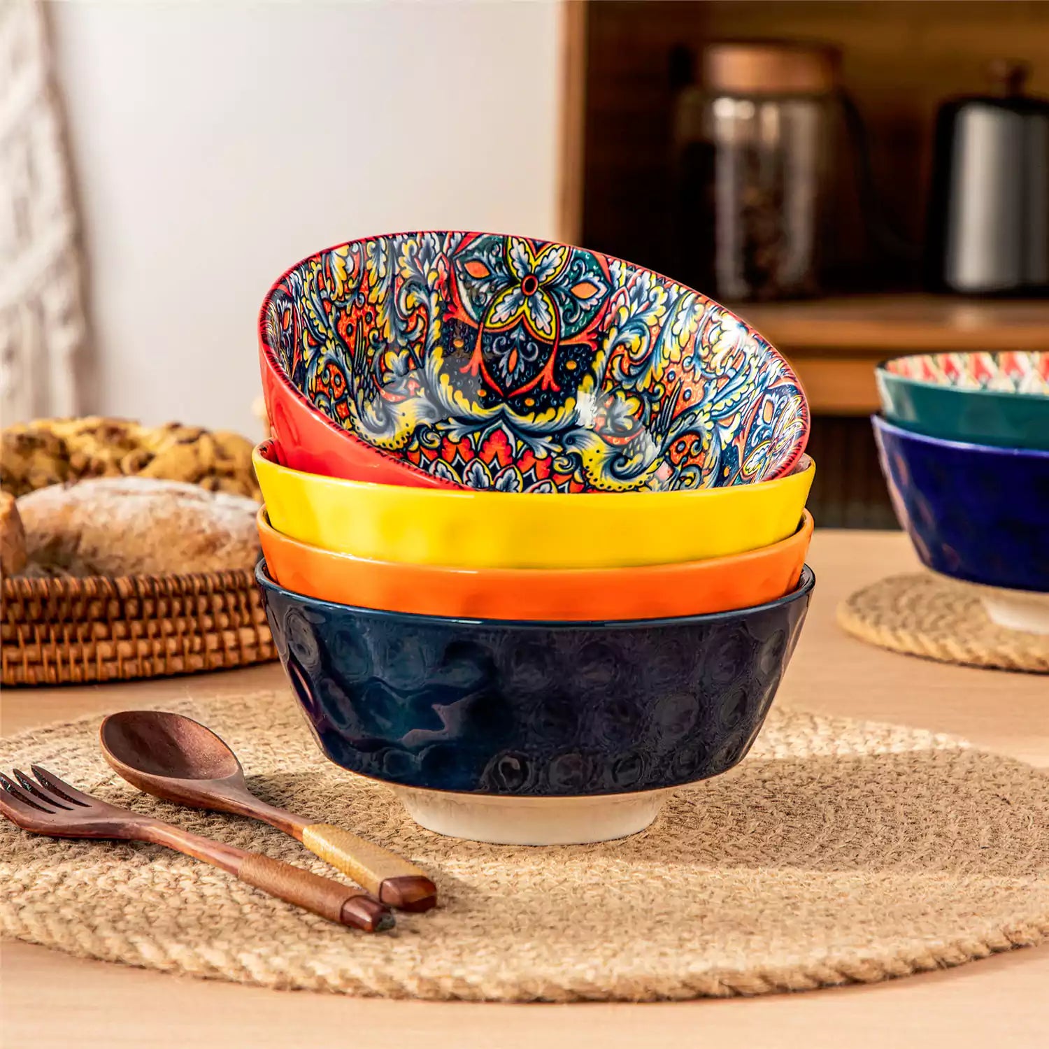 Colorful 26oz Lumi porcelain bowls on rattan placemats filled with oatmeal berries roasted broccoli and cherries on a linen table runner