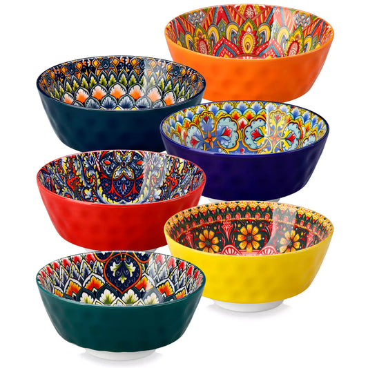 Colorful 26oz Lumi porcelain bowls on rattan placemats filled with oatmeal berries roasted broccoli and cherries on a linen table runner 1500