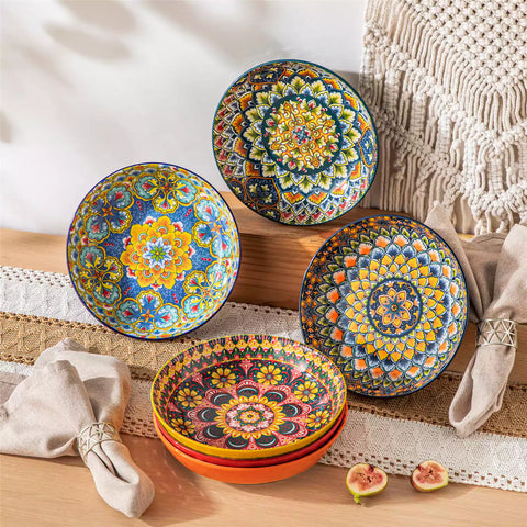Vibrant Boho pasta bowls on a wooden table filled with pasta cherries and persimmons for a colorful, casual dining setting