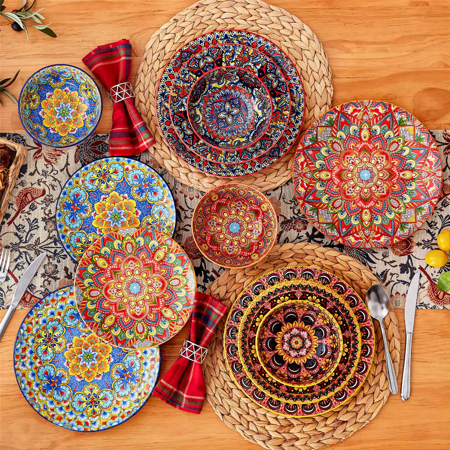 Lumi 12-piece Bohemian dinnerware set for 4 with colorful patterned plates and bowls on a wooden Boho dining table with food