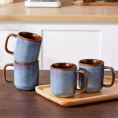 Cup of coffee with latte art cookies and coffee beans on a wooden table featuring onion mugs set of 4 in 12oz