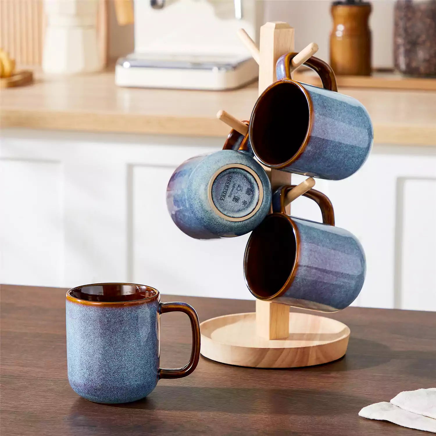 Cup of coffee with latte art cookies and coffee beans on a wooden table featuring onion mugs set of 4 in 12oz