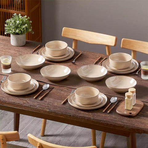 A glossy caramel 16-piece stoneware dinnerware set from the Playa collection - featuring farmhouse charm with plates and bowls for 4 people-vancasso
