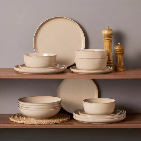 A glossy caramel 16-piece stoneware dinnerware set from the Playa collection - featuring farmhouse charm with plates and bowls for 4 people-vancasso
