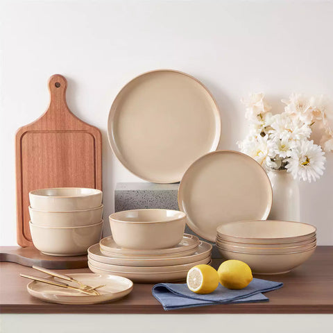 A glossy caramel 16-piece stoneware dinnerware set from the Playa collection - featuring farmhouse charm with plates and bowls for 4 people-vancasso