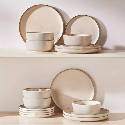 Plays 18-piece stoneware dinnerware set with steak and vegetables on marble table - featuring sandy speckled plates and bowls with brown rims-vancasso