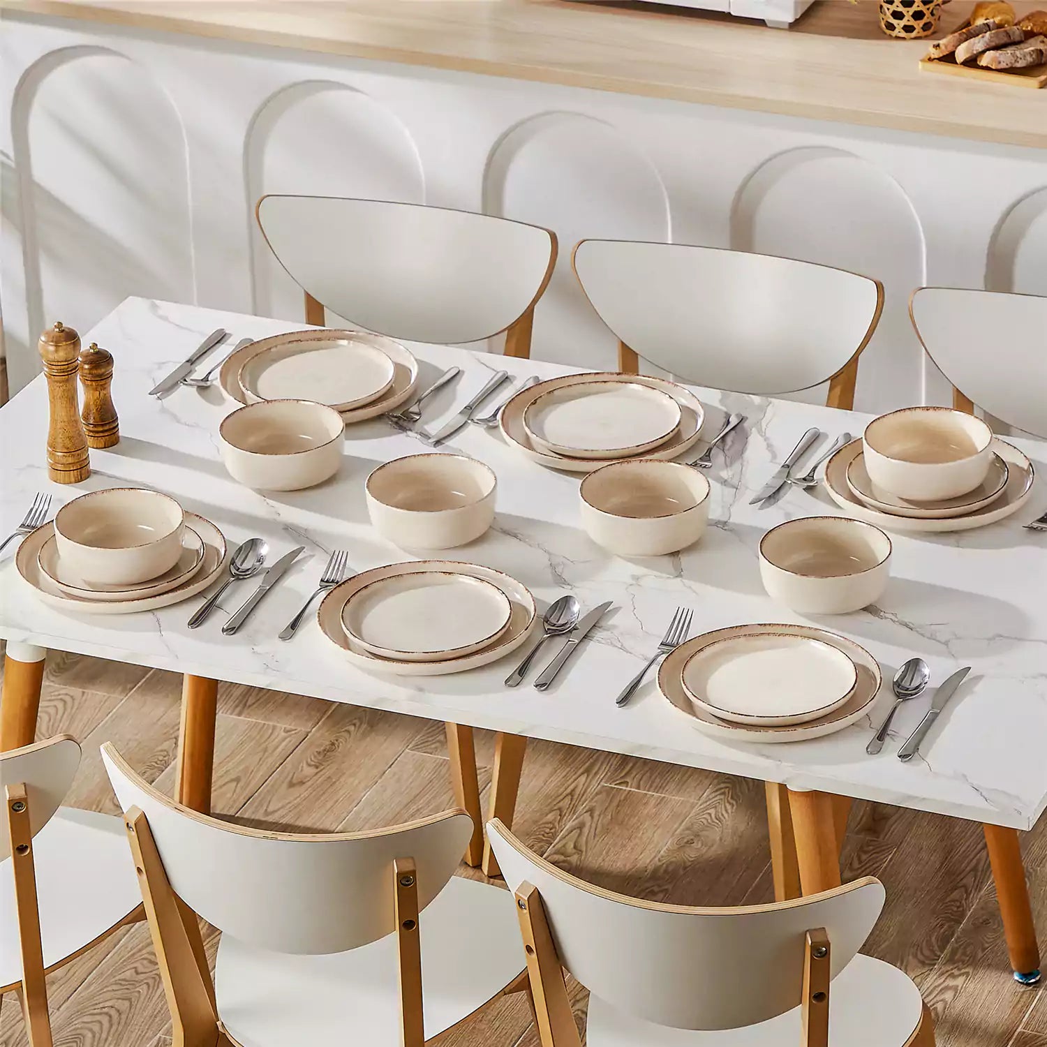 Plays 18-piece stoneware dinnerware set with steak and vegetables on marble table - featuring sandy speckled plates and bowls with brown rims-vancasso