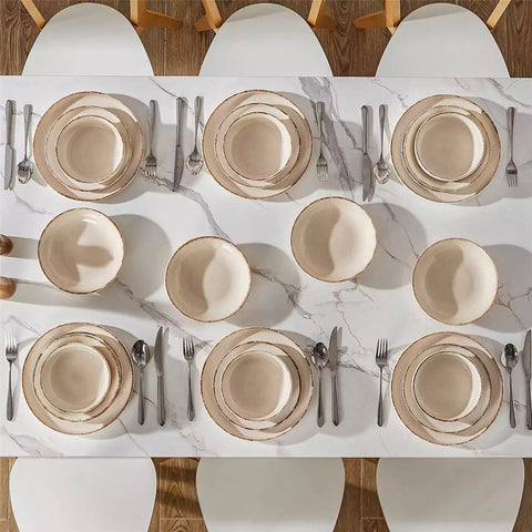 Plays 24-piece stoneware dinnerware set with pasta - soup - and fruit waffle on marble table - featuring sandy speckled plates and bowls with brown rims-vancasso