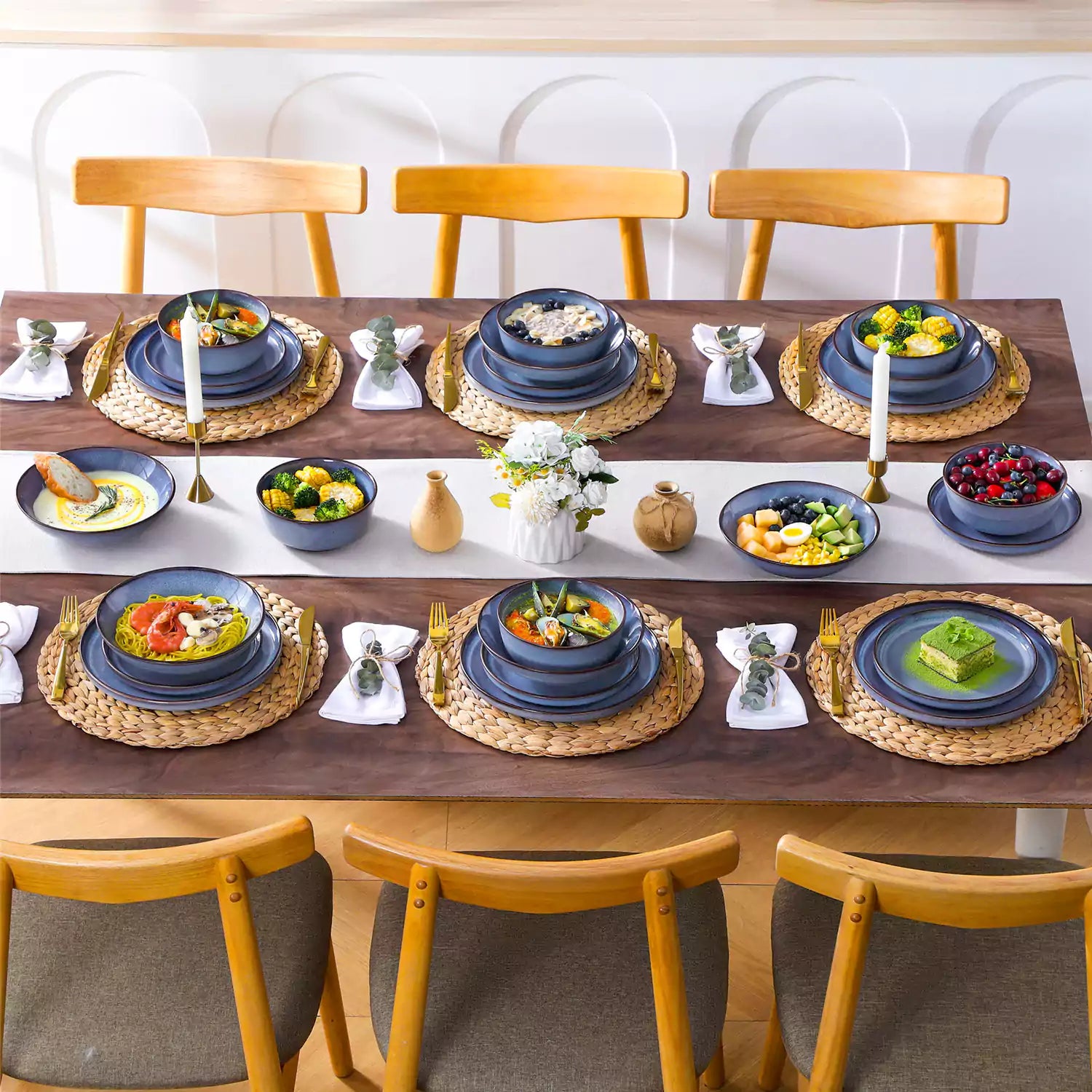 Sata blue stoneware dinnerware set styled dining table with dinner plates salad plates pasta bowls cereal bowls silverware and floral centerpiece farmhouse reactive glaze service for 6