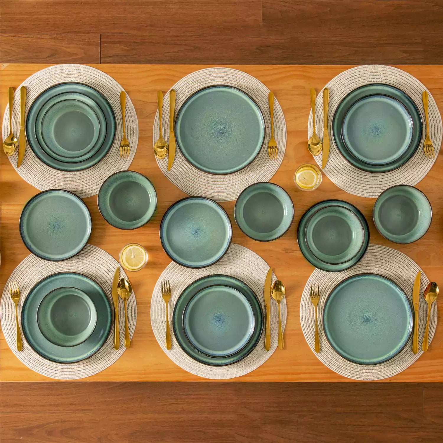 Sata green stoneware 18 piece dinnerware set with dinner plates salad plates and cereal bowls styled on a wooden table with diverse meal setup farmhouse reactive glaze lipped edge service for 6